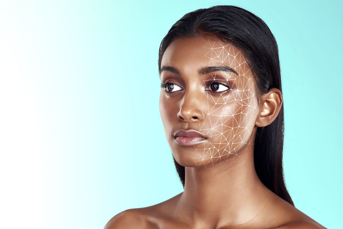 young woman with digital grid on face